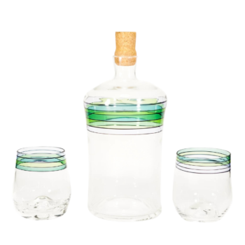 Clear glass set with cork cap and green striped design.